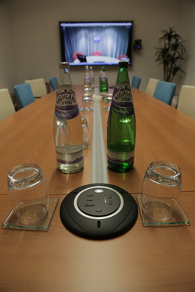 Conference room with focus on control panel